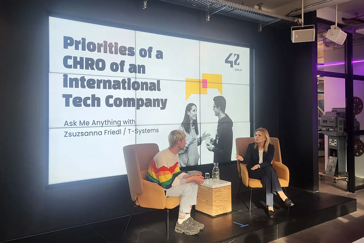 A man and a woman on stage