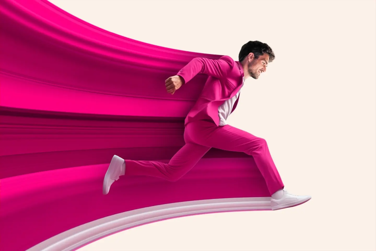 Energetic businessman in magenta suit jumping very far and being pushed even further by a magenta wave