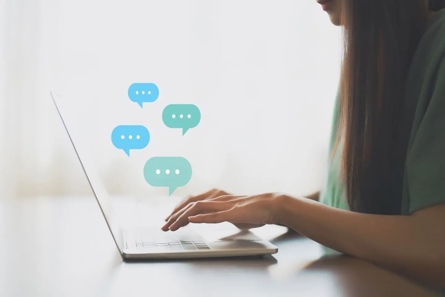 Nurse chatting on laptop
